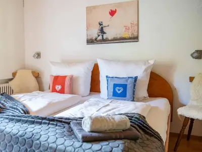 Ein Bett oder Betten in einem Zimmer der Unterkunft Am 12er