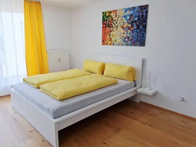 Ein Bett oder Betten in einem Zimmer der Unterkunft Top Glück Apartmenthaus Sonnenschein