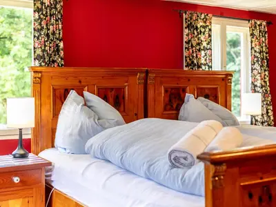 Ein Bett oder Betten in einem Zimmer der Unterkunft Waldhüsle