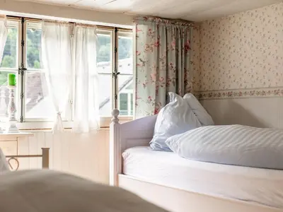 Ein Bett oder Betten in einem Zimmer der Unterkunft Waldhüsle