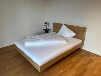 Ein Bett oder Betten in einem Zimmer der Unterkunft Herburger Living