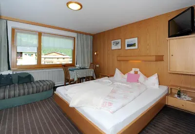 Ein Bett oder Betten in einem Zimmer der Unterkunft Frühstückspension Rüf