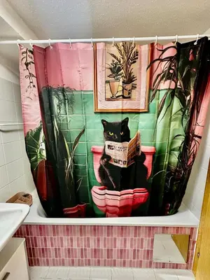 Ein Badezimmer in der Unterkunft Pink Sissi Hideaway mit Seeblick