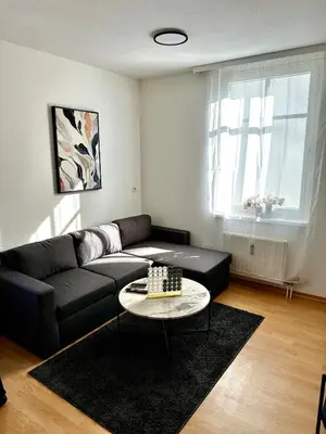 Ein Sitzbereich in der Unterkunft Ferienwohnung nur 1 min vom See