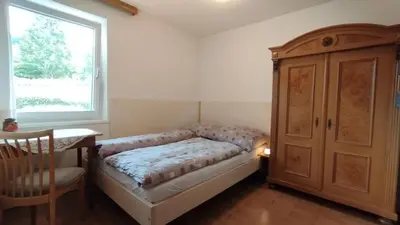 Ein Bett oder Betten in einem Zimmer der Unterkunft Panorama Ferienwohnung Lingenau