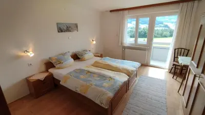 Ein Bett oder Betten in einem Zimmer der Unterkunft Panorama Ferienwohnung Lingenau