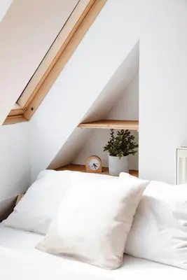 Ein Bett oder Betten in einem Zimmer der Unterkunft Zentraler Charme im historischen Dachgeschoss