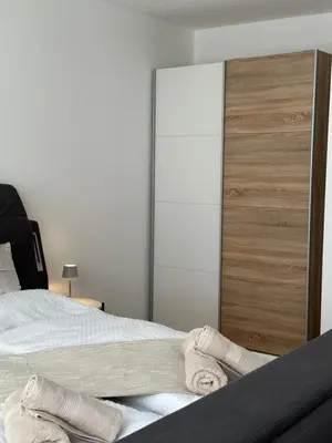Ein Bett oder Betten in einem Zimmer der Unterkunft Charmante Wohnung in der Bregenzer Innenstadt