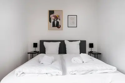 Ein Bett oder Betten in einem Zimmer der Unterkunft homy City Diamant - Penthouse in Feldkirch, Grenznähe und doch Zentral