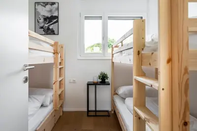 Ein Bett oder Betten in einem Zimmer der Unterkunft homy City Diamant - Penthouse in Feldkirch, Grenznähe und doch Zentral