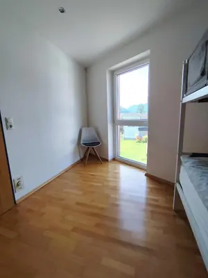Ein Bett oder Betten in einem Zimmer der Unterkunft Bella Vista - 85 m2 Ferienwohnung mit überdachtem Parkplatz und Außenstellplatz - Bergblick