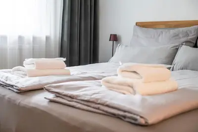 Ein Bett oder Betten in einem Zimmer der Unterkunft 75m2 Designer Apartment close to Bregenz