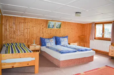 Ein Bett oder Betten in einem Zimmer der Unterkunft Villa Mondschein