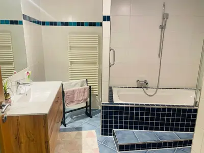 Ein Badezimmer in der Unterkunft WS Ferienwohnung 1