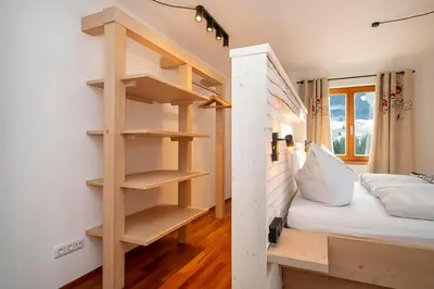 Ein Bett oder Betten in einem Zimmer der Unterkunft Ferienhaus Mazot Ferienwohnungen Kleinwalsertal