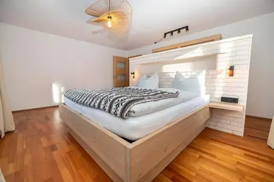 Ein Bett oder Betten in einem Zimmer der Unterkunft Ferienhaus Mazot Ferienwohnungen Kleinwalsertal