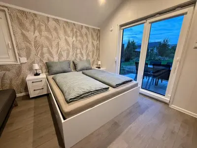 Ein Bett oder Betten in einem Zimmer der Unterkunft TRB - Tiny Room Bodensee 2