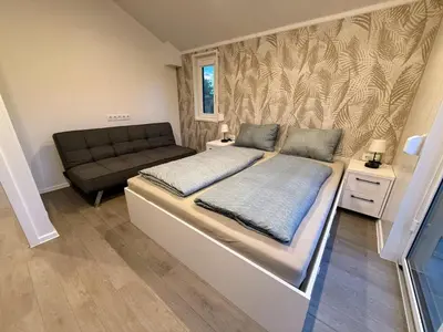 Ein Bett oder Betten in einem Zimmer der Unterkunft TRB - Tiny Room Bodensee 2