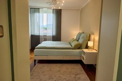 Ein Bett oder Betten in einem Zimmer der Unterkunft Ferienwohnung in Dormbirn