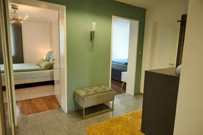 Ein Bett oder Betten in einem Zimmer der Unterkunft Ferienwohnung in Dormbirn
