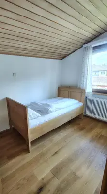 Ein Bett oder Betten in einem Zimmer der Unterkunft Ferienwohnung Lydia