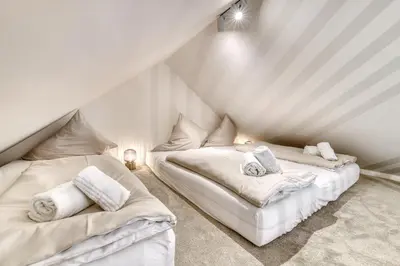 Ein Bett oder Betten in einem Zimmer der Unterkunft Ferienwohnung Alpen Zentral