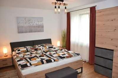 Ein Bett oder Betten in einem Zimmer der Unterkunft ARI's Domizil nähe Bodensee & Bregenz-City