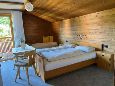 Ein Bett oder Betten in einem Zimmer der Unterkunft Haus Kanisfluh