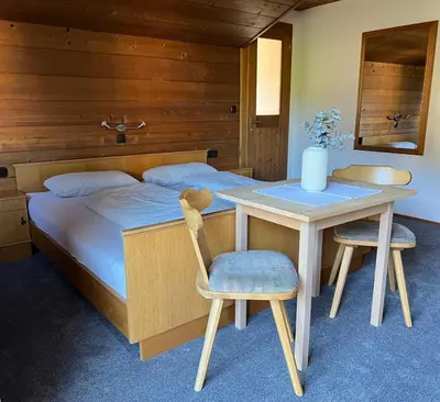 Ein Bett oder Betten in einem Zimmer der Unterkunft Haus Kanisfluh