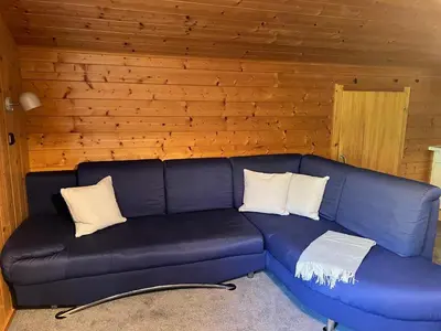 Ein Sitzbereich in der Unterkunft Haus Kanisfluh