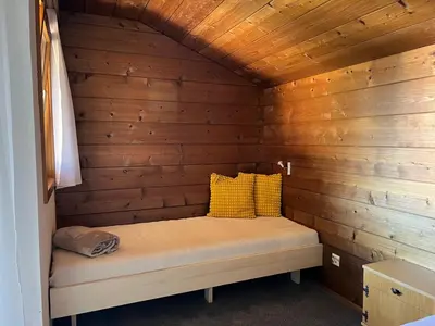 Ein Bett oder Betten in einem Zimmer der Unterkunft Haus Kanisfluh