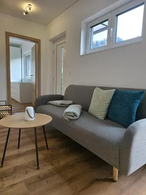 Ein Sitzbereich in der Unterkunft Ländle Lodge, Ferienwohnung nahe Bregenz, Lindau und Bodensee