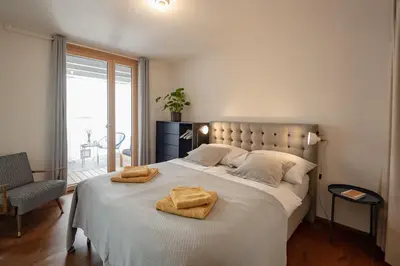 Ein Bett oder Betten in einem Zimmer der Unterkunft Loft am See im Herzen von Bregenz