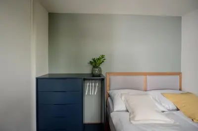 Ein Bett oder Betten in einem Zimmer der Unterkunft Loft am See im Herzen von Bregenz