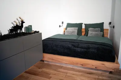 Ein Bett oder Betten in einem Zimmer der Unterkunft Alpin Chalet