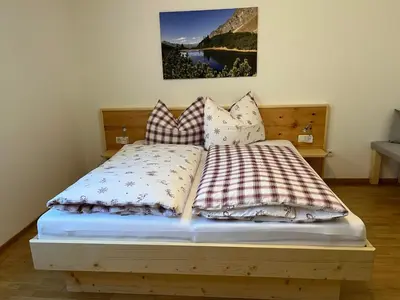 Ein Bett oder Betten in einem Zimmer der Unterkunft Appart Ausblick