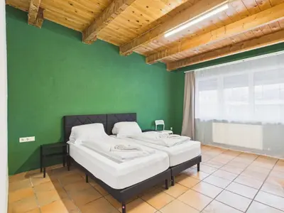 Ein Bett oder Betten in einem Zimmer der Unterkunft CROWN LIVING Babylon Studios Lustenau - Studios nahe Messe und Schweizer Grenze, WLAN, kostenloser Parkplatz, Self Check-in, ideal für Geschäftsreisende und Feriengäste