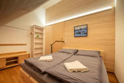 Ein Bett oder Betten in einem Zimmer der Unterkunft Zum Schmied