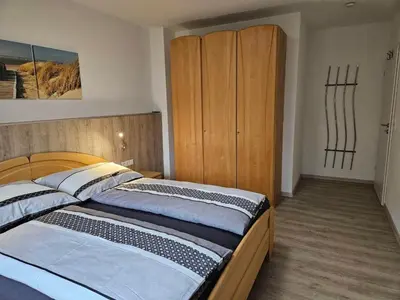 Ein Bett oder Betten in einem Zimmer der Unterkunft Ferienwohnung Palidi