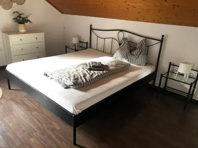 Ein Bett oder Betten in einem Zimmer der Unterkunft Mühlebach Apartment