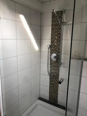 Ein Badezimmer in der Unterkunft Mühlebach Apartment