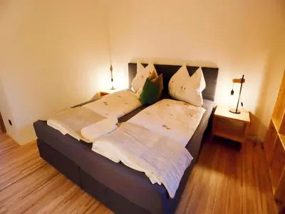 Ein Bett oder Betten in einem Zimmer der Unterkunft Dog-friendly holiday apartment in Bregenzerwald