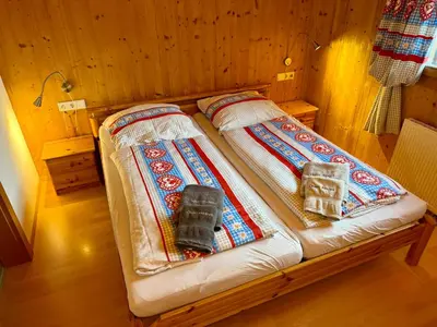 Ein Bett oder Betten in einem Zimmer der Unterkunft Chalet Auszeit Montafon