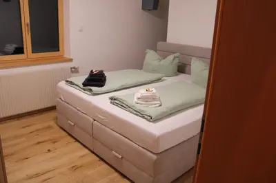 Ein Bett oder Betten in einem Zimmer der Unterkunft Ferienwohnung Vögel