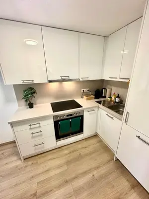 Küche/Küchenzeile in der Unterkunft Ferienwohnung Golden Hour mit Seeblick