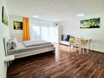 Ein Sitzbereich in der Unterkunft Top 5 Apartmenthaus Sonnenschein