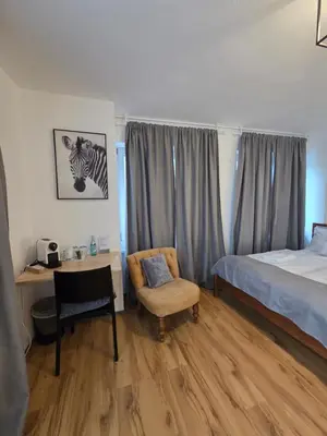 Ein Bett oder Betten in einem Zimmer der Unterkunft Gasthaus Löwen in Tisis,Einzelzimmer