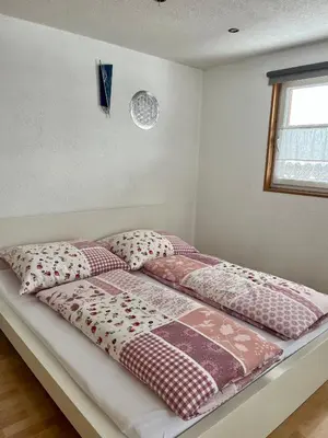 Ein Bett oder Betten in einem Zimmer der Unterkunft Ferienwohnung Fink