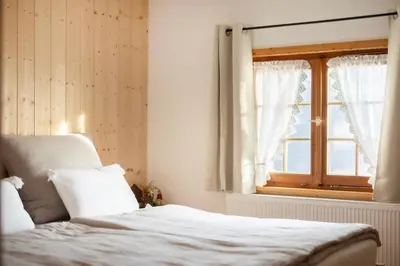 Ein Bett oder Betten in einem Zimmer der Unterkunft Ferienwohnung Firstblick