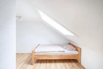 Ein Bett oder Betten in einem Zimmer der Unterkunft Ferienwohnung Firstblick
